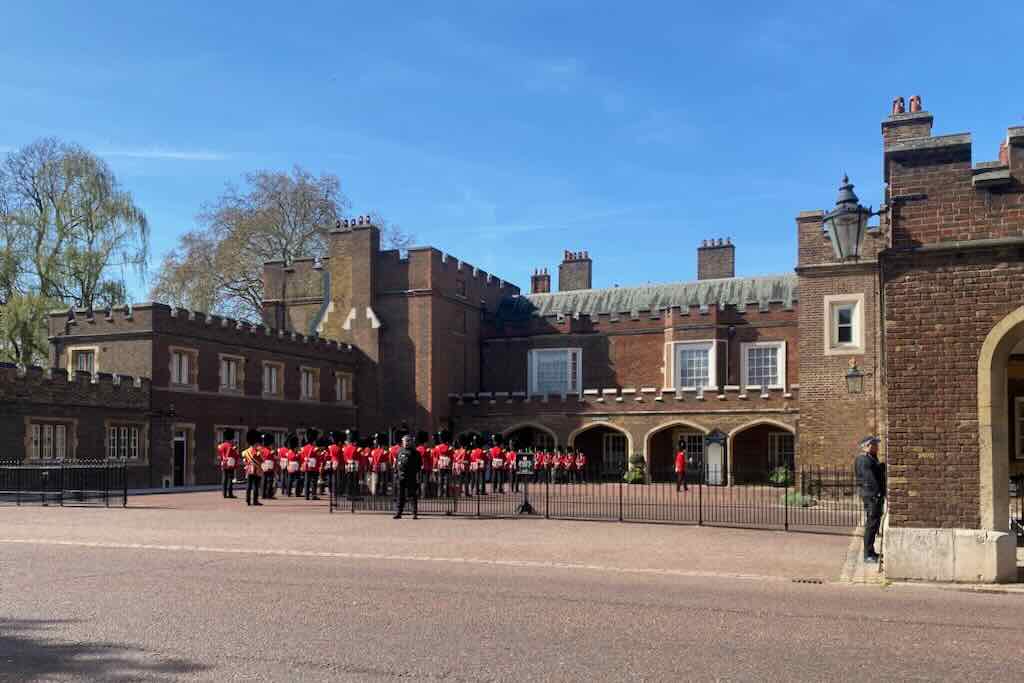 British guards in front of St James Palace in London on Marlborough Rd beginning changing of the guards ceremony