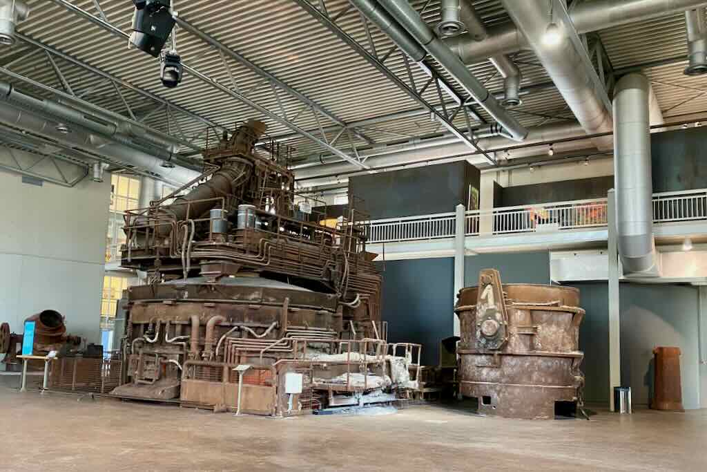 old industrial machinery inside the dasa working world museum in dortmund germany