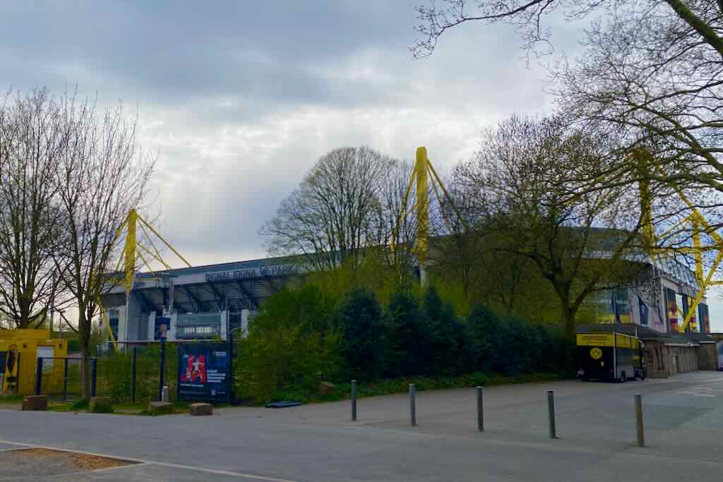 outside signal iduna park in dortmund germany in early spring with first leaves on trees